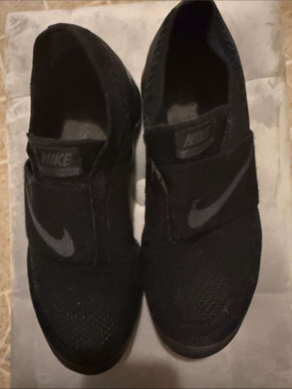 Nike Men’s Black Slip-On Sneakers with Gray Swoosh
